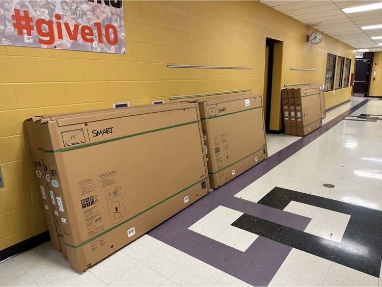 smart boards sitting in hallways 